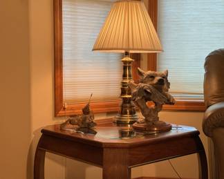 Brass touch lamp, Randy Reading "Winter Warmth" signed and numbered sculpture, wood end table with glass inlays. Those wolves are thinking about eating the quail ornaments to the left... You should buy them before something bad happens.
