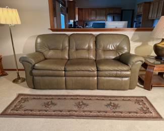 This comfy leather couch is perfect for naps after you get tired of taking pictures of everything else. You just have to turn off the floor lamp and the large bronze table lamp if you really need to snooze.