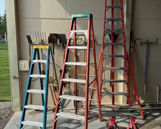 Papa Ladder, Mama Ladder, Baby Ladder (well, maybe Teenager Ladder). But also don't miss those 6 ton jack stands or the collection of garden implements trying to hide back there.
