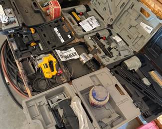 Cased tools aplenty. Several air nailers/air staplers, a very nice Porter Cable circular saw and multiple rotary tools of difference sizes (Dremel and Dewalt).