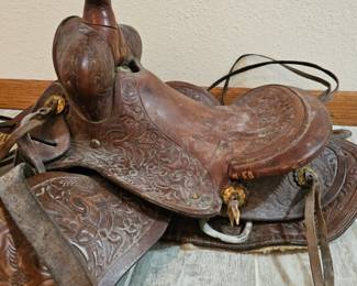 Lot #241 - Vintage Tooled Leather Western Horse Saddle with Intricate Floral Carvings