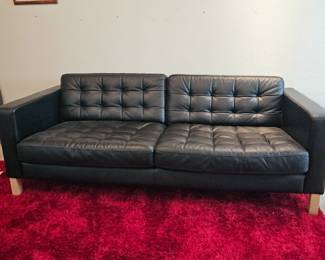 Lot #188 - Ikea Karlstad Black Leather Tufted Sofa