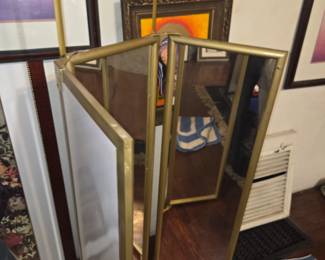 Over-the-door Trfold Gold framed mirrors. 

Get the 3 sided view anywhere. Free standing  or hang over the door..  3 mirrors adjust to your desired position
Closes up to just one mirror when not in use.  $150.

YOU WILL LOVE THIS TRIFOLD OVER-THE-DOOR MIRROR!!