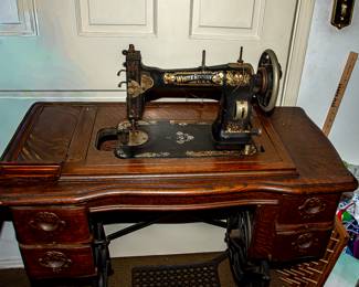 Antique Sewing Machine in OAK Cabinet