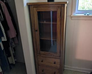 Wood storage cabinet