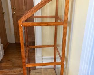 Vintage IKEA cabinet the three glass shelves are wrapped in the newspaper $150