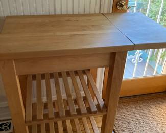 butcher block kitchen cart with drop leaf side and two shelves 20” x 24/36” x 36”h $185
