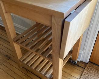 butcher block kitchen cart with drop leaf side and two shelves 20” x 24/36” x 36”h $185