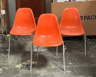 Herman Miller Eames Fiberglass Orange Shell Stacking Chairs (Set of 3)