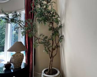 Fish bowl and silk plants