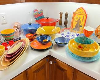 Le Creuset dutch ovens, colorful pottery pieces including Rainbow Gate, Bauer and Dan Swanson