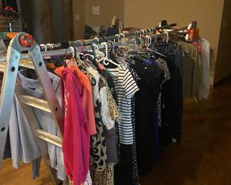 Women's size 10 or mediums, plus a couple of men's dress shirts, and coats, all large.