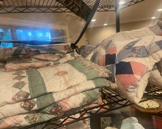 2 large quilts, the green & pink is a Queen, Blue & Pink, I'm not sure.