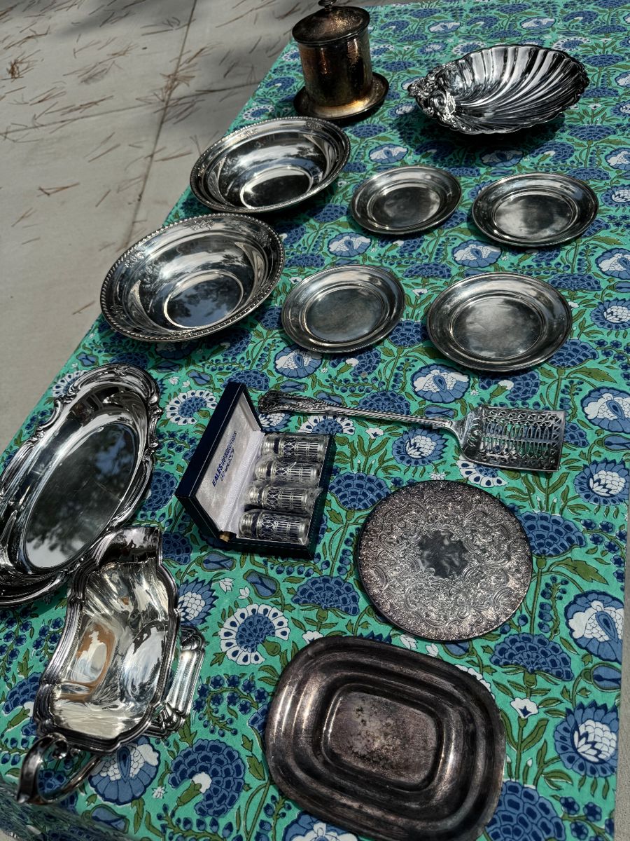 Lots of sterling and silver plate. Two Wallace sterling 10" bowls, 4 Stieff sterling bread and butter plates monogrammed, 4 Eales of Sheffield salt and pepper shakers in case, Reed & Barton tray, Gorham dish, shell dish, biscuit tin/ice bucket, gravy boat