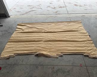 Large natural linen roman shade with blue accent trim, works perfectly