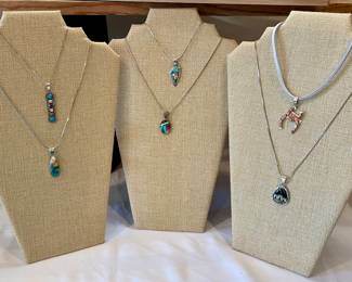 STERLING SILVER AND TURQUOISE INLAID PENDANTS