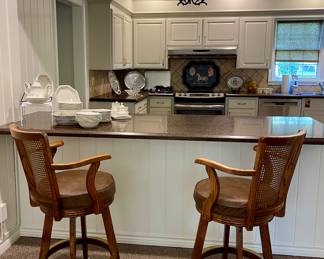 SWIVEL BARSTOOLS WITH CANE BACK