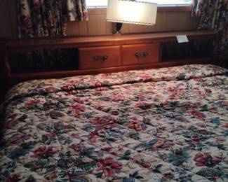 Kingsize Bed and headboard with matching dresser.               The custom Bedspread and matching draperies are also for sale. Two large windows of draperies.