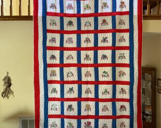 Vintage hand-embroidered, hand-quilted quilt.