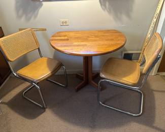 Double drop leaf table and 2 chairs (sold separately)