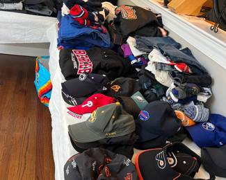 Many pieces of clothing and hats