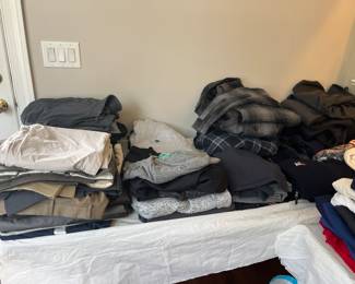 Many pieces of clothing and hats