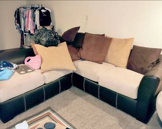 Leather Sectional Sofa. There is a barrel chair that matches.