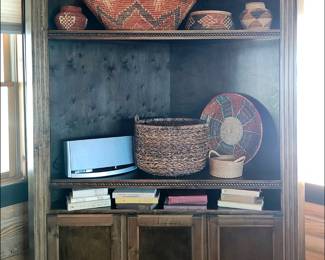 Hand Woven Baskets, Corner Entertainment Center, Collectible Books.