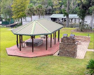 Gazebo, Decking, Hot Tub, Smoker, Firepit, Pavers.