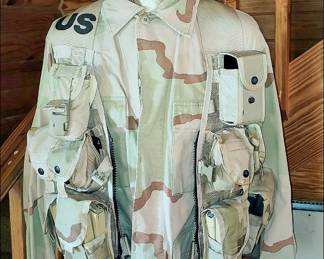Military Uniform.  Pockets are full of equipment.
