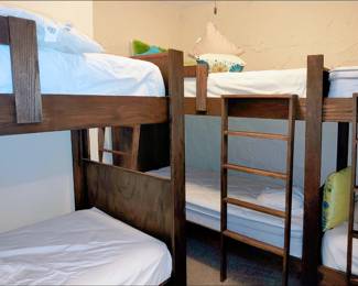 One of several bunk beds in the bomb shelter.