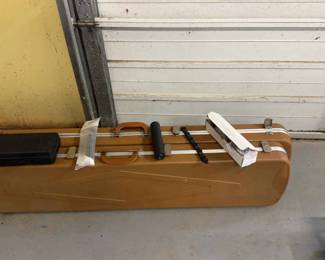 Two Hardshell Gun Cases And Scopes
