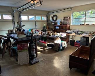 Electronics, Christmas items, Barbie toys, dishes, shredder, office supplies, vacuum,  shop vac, 2 sheets of plywood, etc