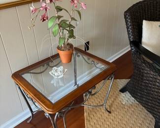 Wood and wrought iron glass end table.  Matching coffee table also available