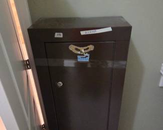 #56	Homak Home Security Gun Cabinet w/keys  - 21x10x55	 $150.00 
