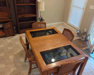 #98	Wood Table w/2 glass inserts & 1 Leaf w/4 Rolling Chairs  - 39x39-59x29	 $150.00 