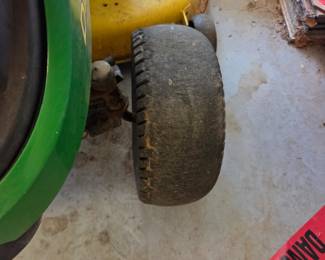 #41	John Deere Riding Mower/Tractor Runs  Model D125 - 168 Hours - w/grass catcher & Mulcher - 42" Cut - (front tire worn)	 $1,100.00 