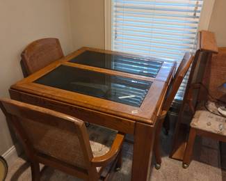 #98	Wood Table w/2 glass inserts & 1 Leaf w/4 Rolling Chairs  - 39x39-59x29	 $150.00 
