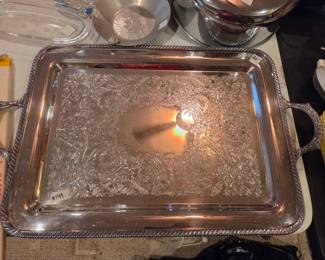 #149	Rogers Silver Plated 20" Serving Tray	 $20.00 

