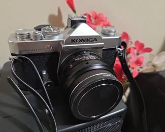 #67	Konica T3 Camera - Film w/case - 35MM w/3 lenses - 55mm, 28mm, & 85/205MM (vivitar Lenses)	 $80.00 
