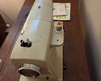 #81	Sears Kenmore Vintage Metal Sewing Machine and Cabinet	 $60.00 
