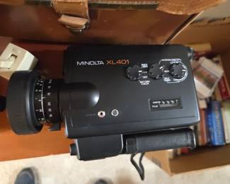 #72	Minolta XL 401 Super 8 Movie Camera w/Polaroid Soft-Sided Case	 $100.00 
