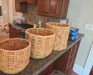 #20	Set of 3 Hand-Woven Baskets - Heights are 11", 9", 7"	 $30.00 
