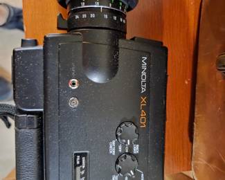 #72	Minolta XL 401 Super 8 Movie Camera w/Polaroid Soft-Sided Case	 $100.00 
