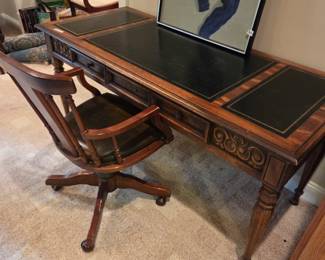 #102	Writing Desk w/leather Top & 1 Drawer w/1 rolling Wood Chair on Wheels  - 62x27x30	 $175.00 
