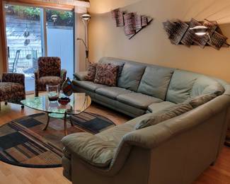 Sectional comes apart in 3 pieces. Color is a light green.
