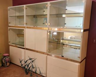 Wow! This modular wall unit is stunning in person. Each section does come apart, so you can arrange how you wish.