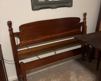 Double bed with side rails and slats