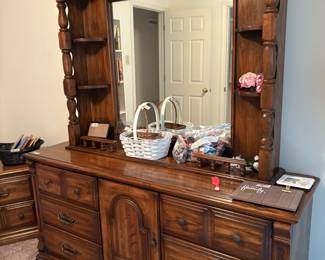Dresser in bedroom with large mirror & great storage 