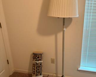 Stand lamp & small rug in bedroom